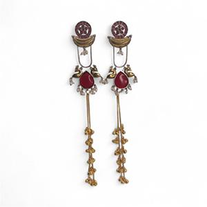 Elegant handcrafted earrings with red stones